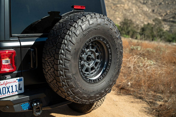 DV8 Offroad MTO Series Spare Tire Carrier (MPN: TCJL-13)